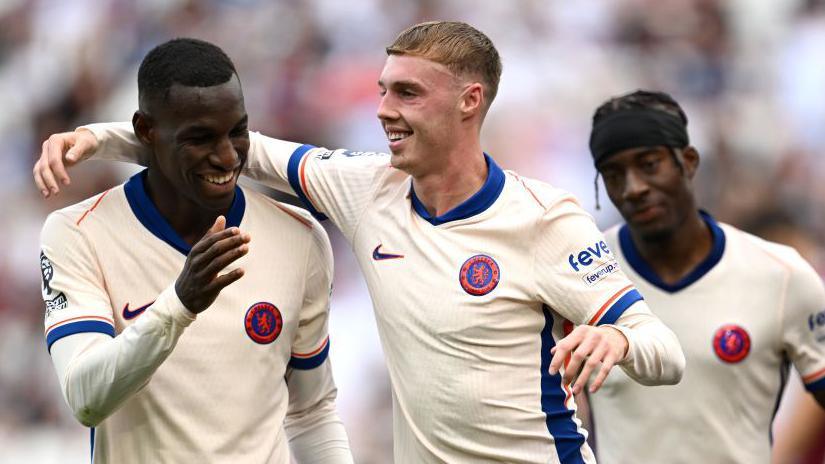 Moises Caicedo (left) with Chelsea team-mates Cole Palmer (centre) and Noni Madueke