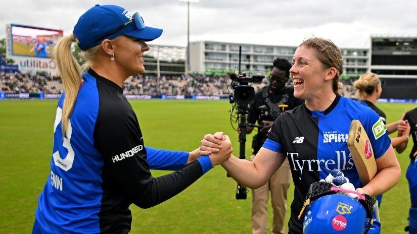 Sarah Glenn and Heather Knight celebrate