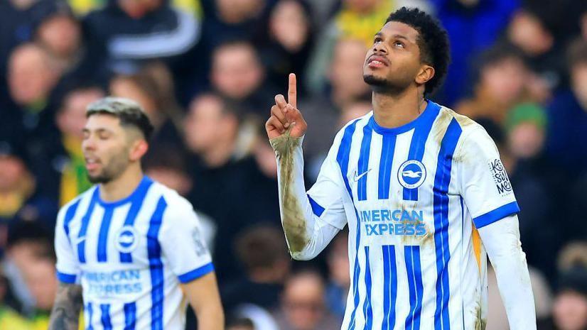 Georginio Rutter pointing to the sky after scoring for Brighton