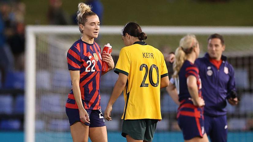 Kristie Mewis and Sam Kerr following a match between the USA and Australia in 2021