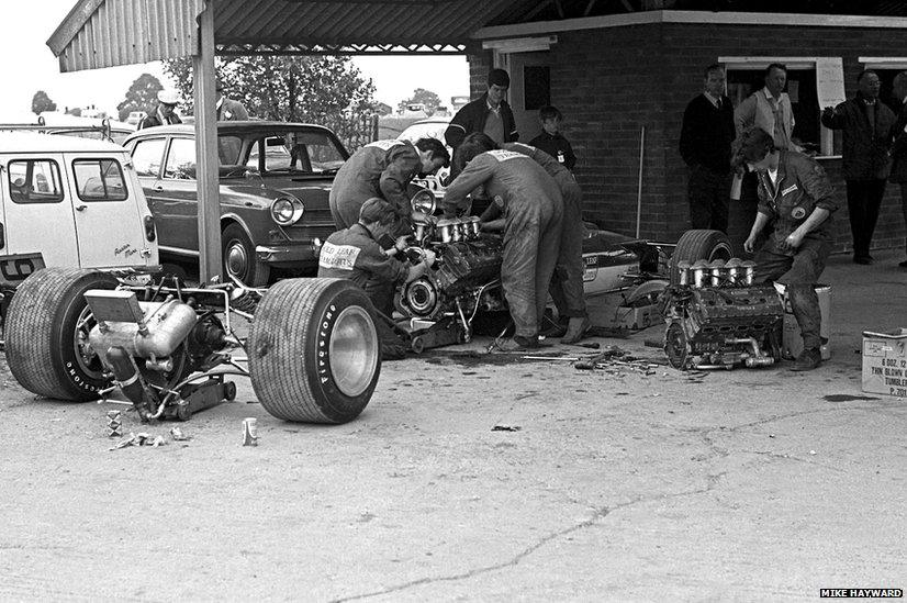 Mechanics work on Graham Hill's Lotus 49B