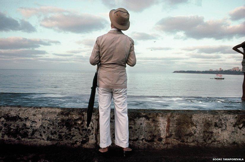 The man in the sola hat, Bombay Archival pigment print, 1985 by Sooni Taraporevala