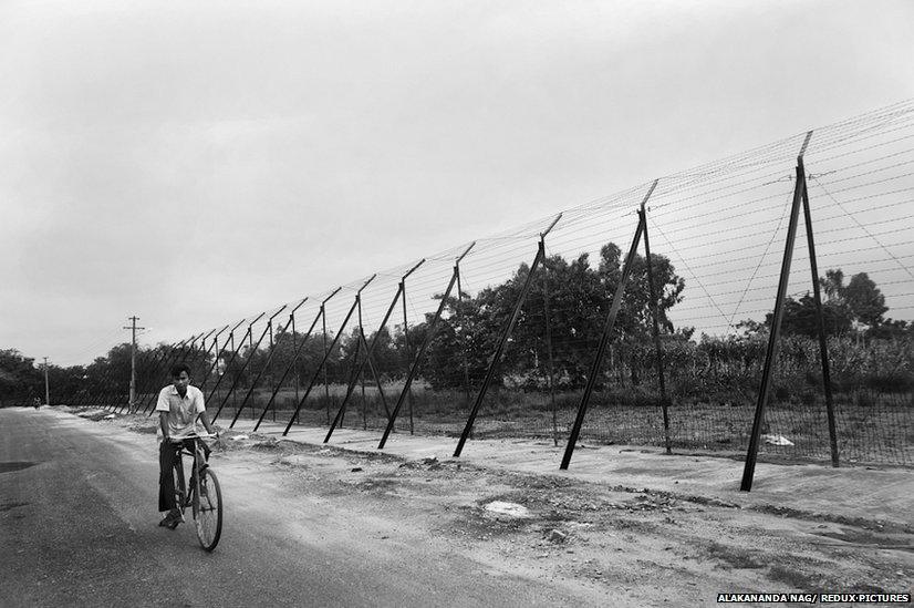 Indo Bangladesh border on the Indian side. Most of the roughly 2400 mile long border is barbed.