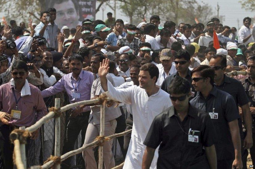 Rahul Gandhi of Congress party greets supporters during an election rally at Balasinor in the western Indian state of Gujarat.