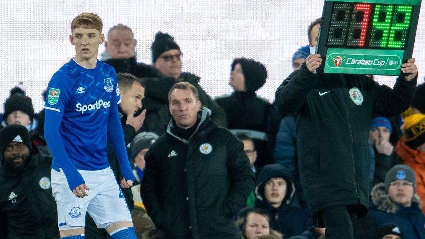 Gordon getting ready to come on as a substitute against Leicester