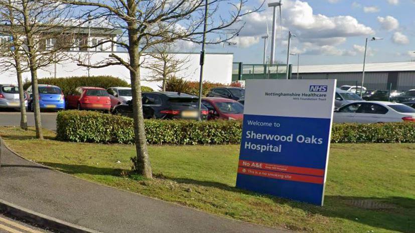 Sign which reads WELCOME TO SHERWOOD OAKS HOSPITAL