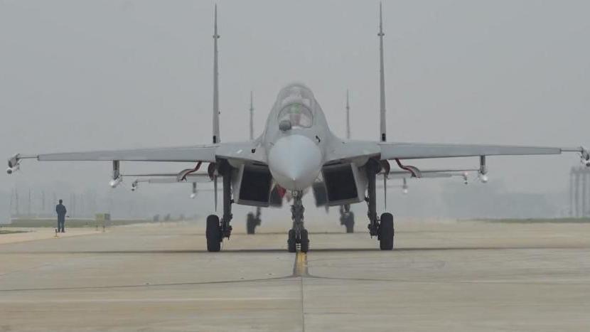 An Air Force aircraft takes part in military drills by the Eastern Theatre Command of China's People's Liberation Army (PLA) around Taiwan, in this screengrab from a handout video 