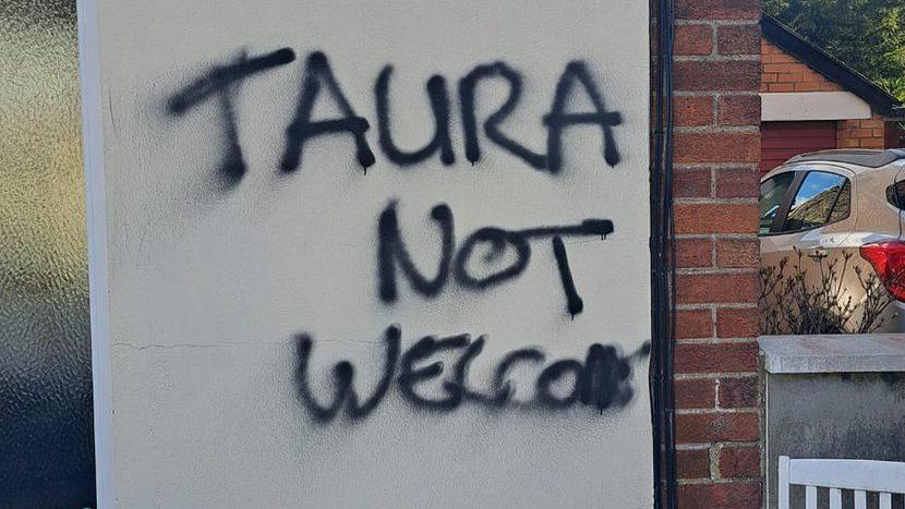 Graffiti on Takura's home