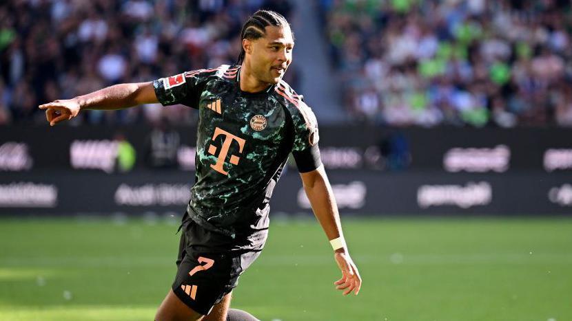 Serge Gnabry celebrates scoring for Bayern Munich against Wolfsburg