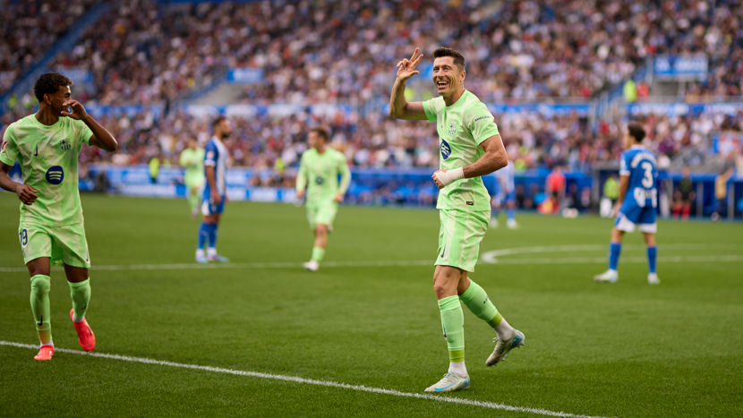 Robert Lewandowski celebrates scoring for Barcelona