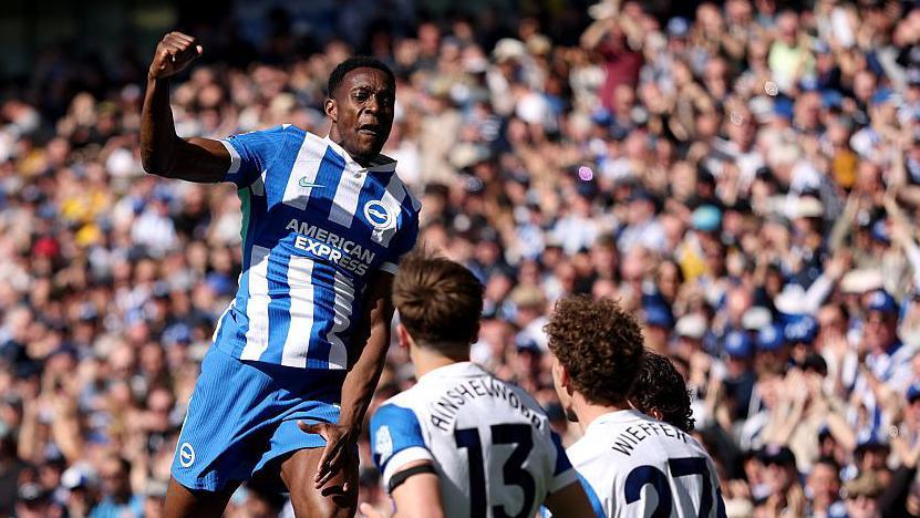Danny Welbeck celebrates his second goal against Liverpool