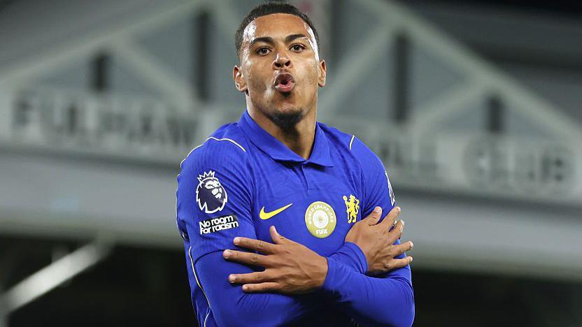 Morgan Rogers imitates Cole Palmer's 'cold' celebration by crossing his arms and rubbing them across his chest after scoring against Fulham