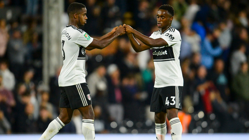 Ryan and Steven Sessegnon on the pitch together playing for Fulham in 2018