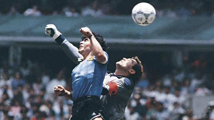 Maradona scores the 'Hand of God' goal past Peter Shilton