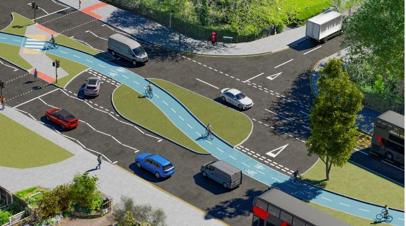 A computer generated image showing a cycle path in blue which goes over an area of green land. There are road markings separating the cycle route from several vehicles which are on the grey roads.