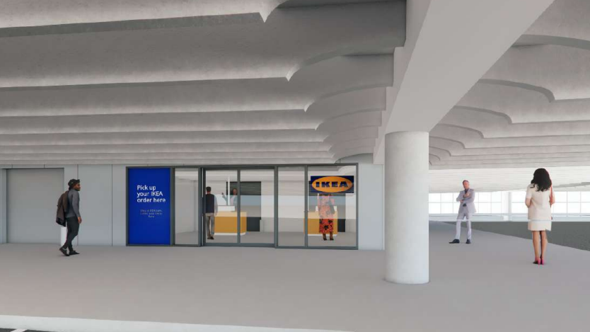 A CGI image of a white office with the Ikea logo on the side of it. The office is built in what is currently a multi-storey car park