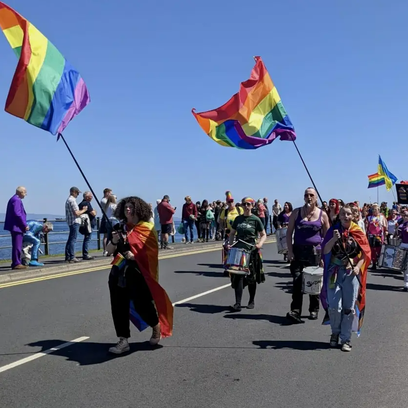 The first Arran Pride march taking place in 2022.