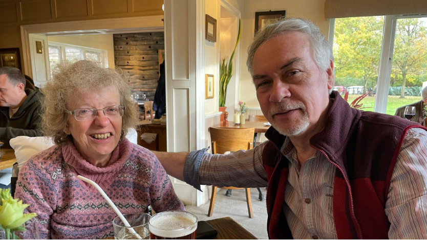 David and Alison sat together at a pub