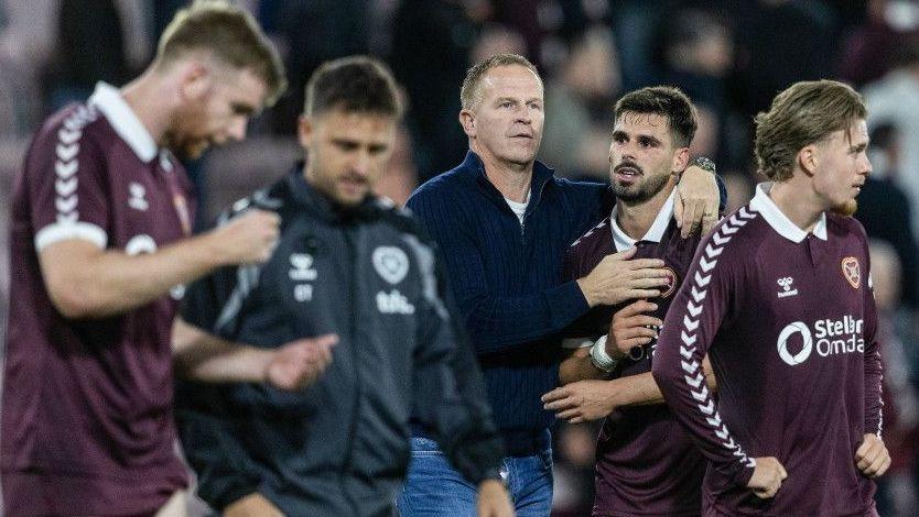 Wouter Vrancken embraces Hearts striker Claudio Braga
