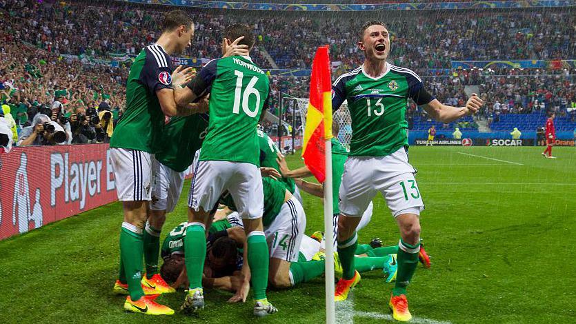 Corry Evans celebrates a Northern Ireland goal