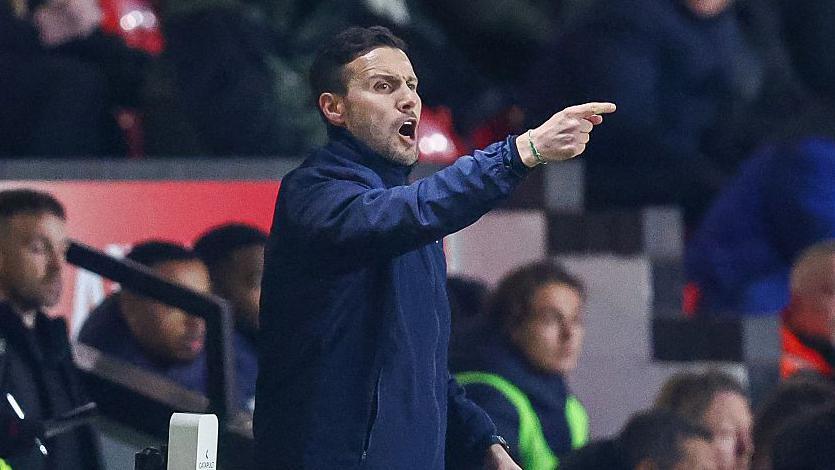 Walsall head coach Mat Sadler shouts instructions to his players 