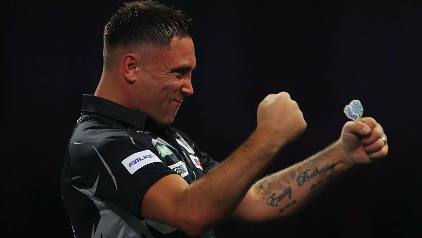 Darts player Gerwyn Price celebrates