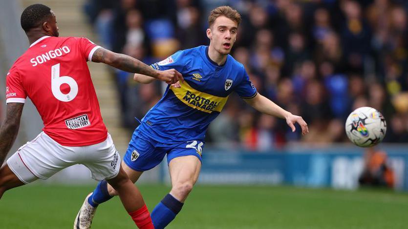 Jack Currie of AFC Wimbledon during the League Two match between AFC Wimbledon and Morecambe FC 