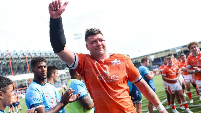 Edinburgh's Grant Gilchrist celebrates at full time during a EPCR Challenge Cup Quarter-Final between Edinburgh and Vodacom Bulls at The Hive Stadium, on April 12, 2025, in Edinburgh, Scotland.