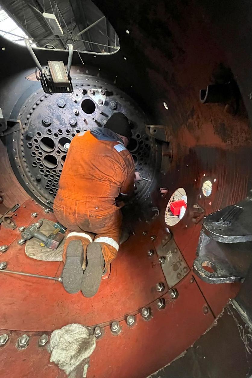 Holes being prepared for rivets inside Carmyllie Pilot