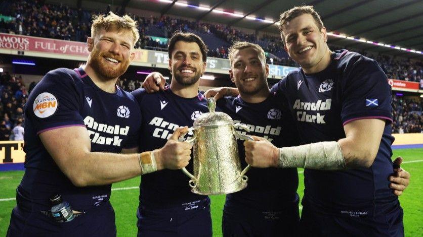 Scotland players celebrate with the Calcutta Cup