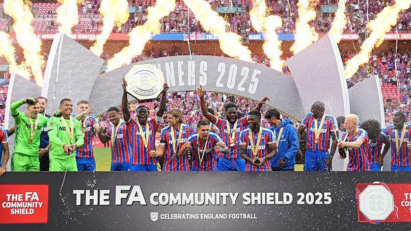 Crystal Palace players celebrate winning the Community Shield