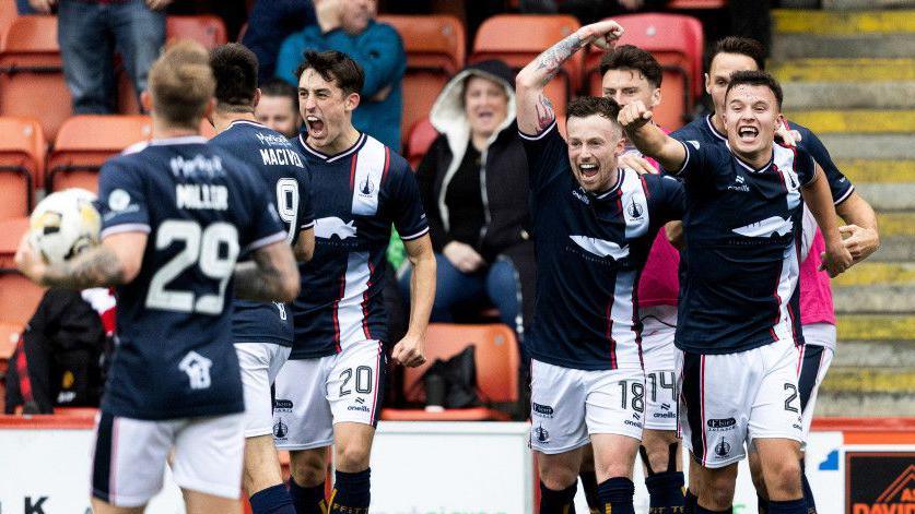 AIRDRIE, SCOTLAND - SEPTEMBER 14: Falkirk's Dylan Tait celebrates scoring to make it 1-0 during a William Hill Championship match between Airdrieonians and Falkirk at Albert Bartlett Stadium, on September 14, 2024, in Airdrie, Scotland. (Photo by Mark Scates / SNS Group)