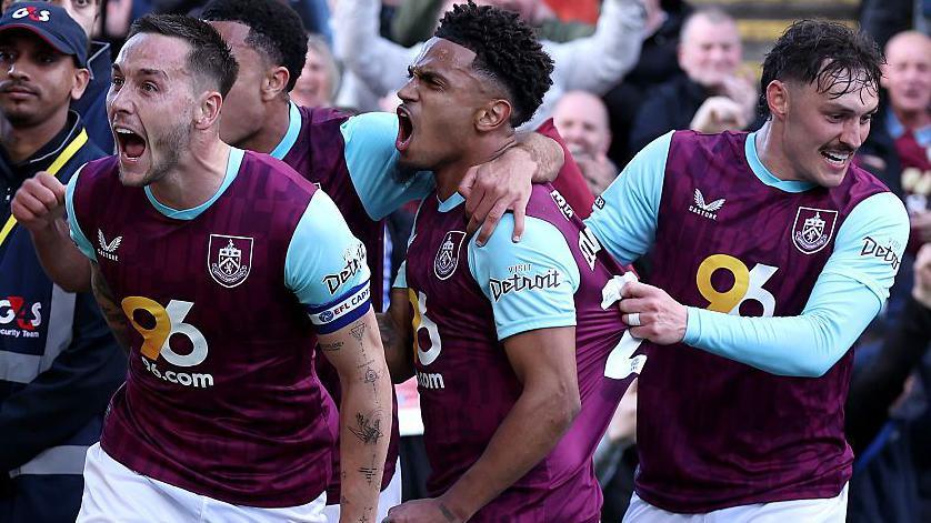Josh Brownhill celebrates his opening goal for Burnley against Sheffield United with team-mates Marcus Edwards and Connor Roberts.
