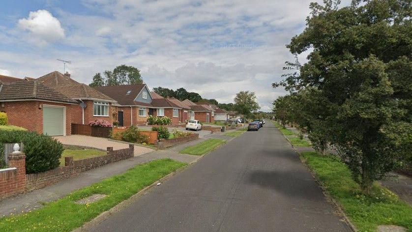 Part of Rosemary Way, Waterlooville, with well-kept gardens in front of bungalows