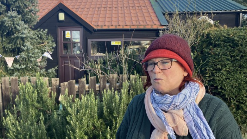 Katie Teakle standing outside her chalet at the Humberston Fitties