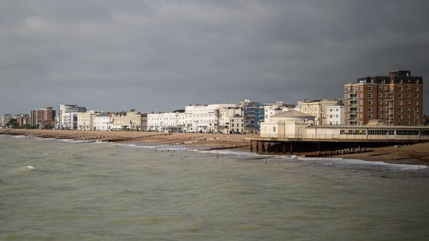 A shot of Worthing seafront. There are grey skies above.