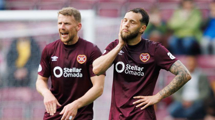 Hearts duo Jorge Grant and Stephen Kingsley following last weekend's defeat to Dundee