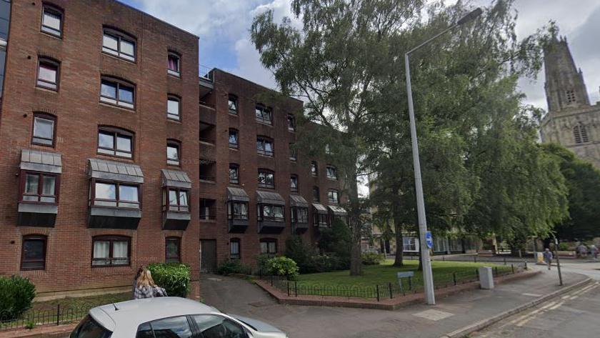 The Dukeries in Gloucester - a block of flats near a church in the city centre