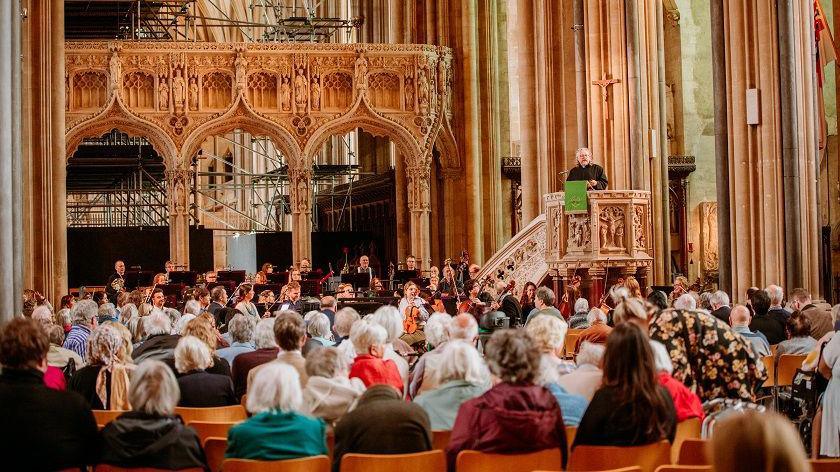 An audience in Bristol Cathedral