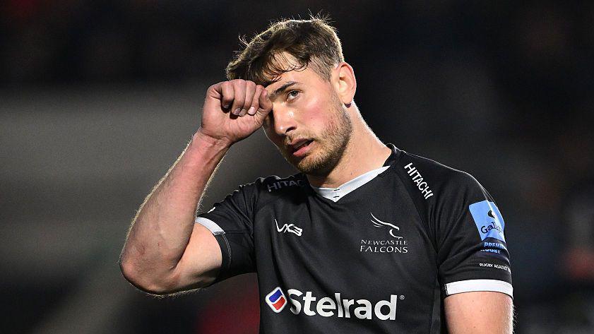 Ben Stevenson walking off the field after being shown a red card