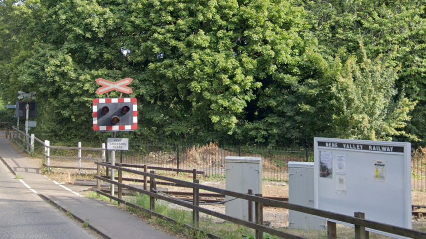 Level crossing on the Nene Valley Railway