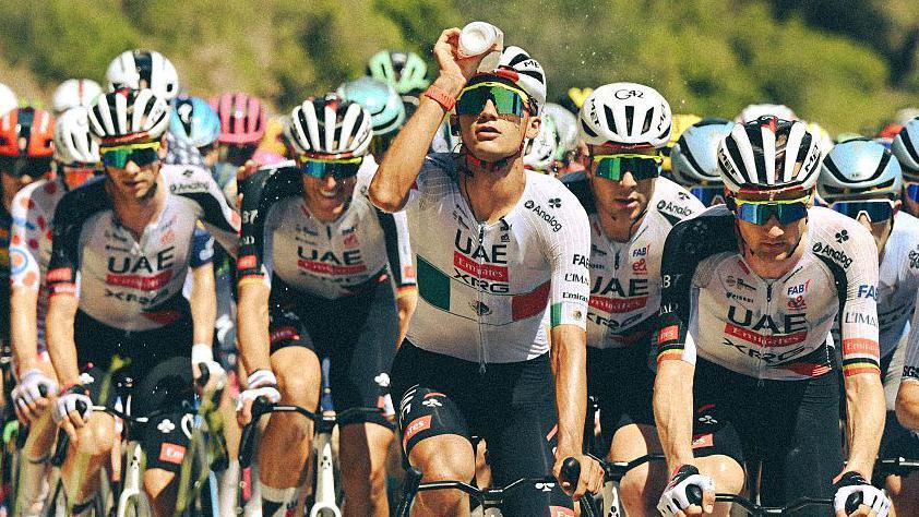 Isaac del Toro pours water on his head during stage two of the 2026 Tour de France