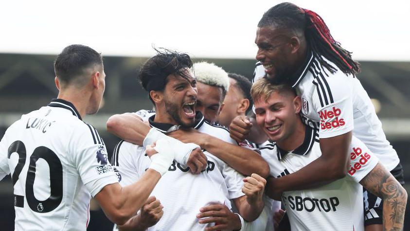 Raul Jimenez (centre) celebrates with his Fulham team-mates after scoring against Newcastle