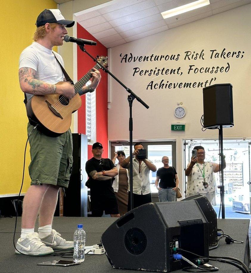 Ed Sheeran performing at NZ school