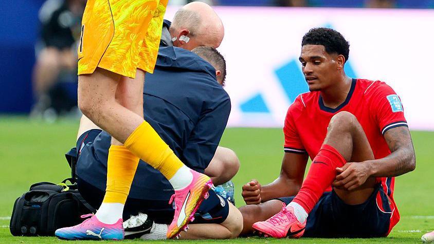 Jarell Quansah receives treatment on an injury during England's 2026 FIFA World Cup Group L game against Panama