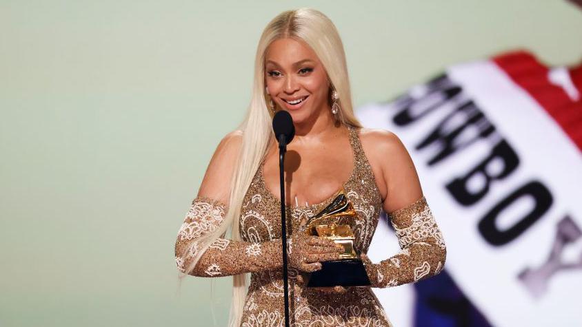 beyonce on stage accepting award at grammys