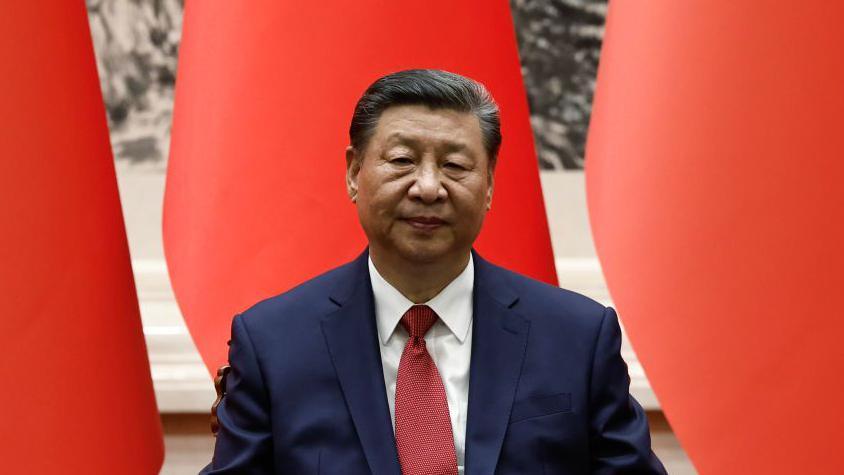 Chinese President Xi Jinping in a navy blue suit at the Great Hall of the People on May 31, 2024 in Beijing, China.