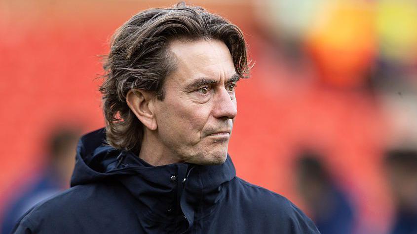 Tottenham Hotspur manager Thomas Frank looks on