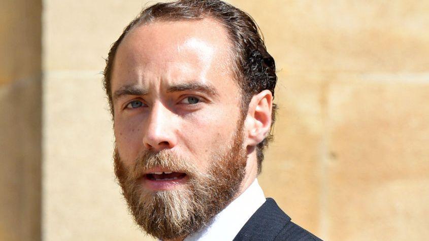 James Middleton wearing a suit and tie