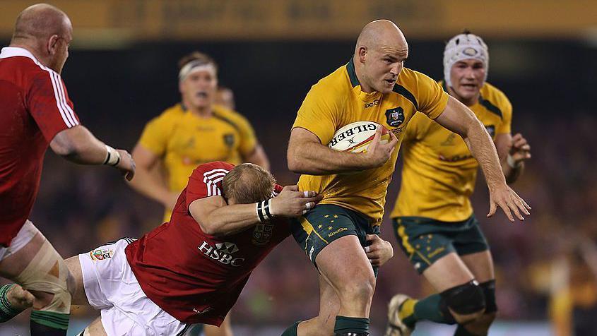Stephen Moore running through the British and Irish Lions defensive line in 2013